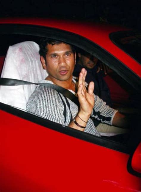 Sachin Tendulkar takes possession of his prize Ferrari-360 Modena ...