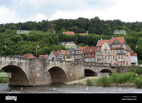 Historic Half Timbered Buildings Frame Werra River In Hann Muenden