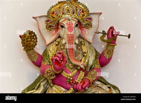 The Elephant God in lotus position Stock Photo - Alamy