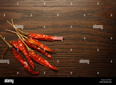 Pepper Spice Hot Dried Chilli Chili Food Aliment Pepper Spice Wood Stock Photo Alamy