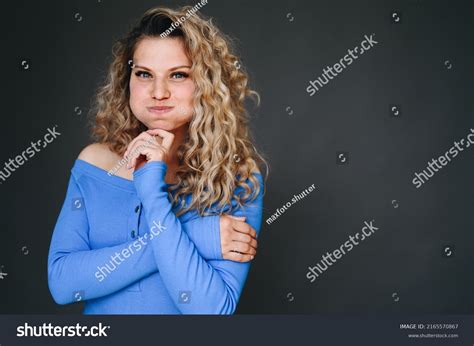 Curly Blonde Girl Blows Her Cheeks Stock Photo 2165570867 Shutterstock
