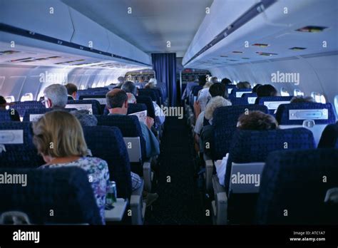 Los Pasajeros Que Viajen En Clase Turista De La Cabina De Los Aviones