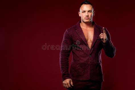 Portrait Of Handsome Stylish Man Bodybuilder With Naked Torso In Elegant Suit Guy Showing