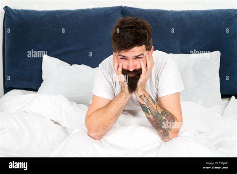 Feeling Sleepy Mature Male With Beard In Pajama On Bed Asleep And