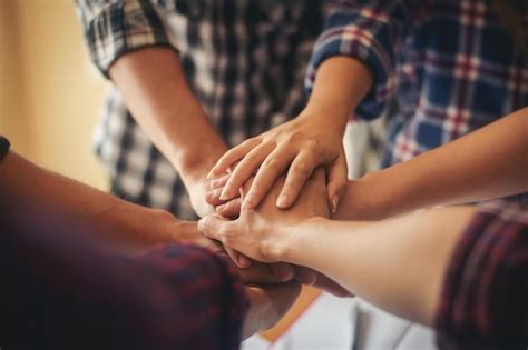 Premium Photo Midsection Of People Stacking Hands