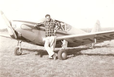 My grandpa and his plane sometime in early 40's : pics