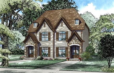 Plan 82334 Tudor Style With 2 Bed 3 Bath Duplex House Plans