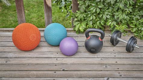 Heavy Slam Balls Iron Kettlebell And Dumbbell Stock Photo At