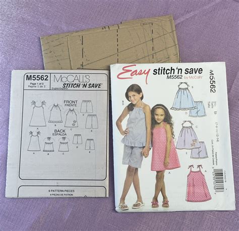 McCalls Easy Stitch N Save M5562 Girls Dress Size 7 8 10 12 14 Pattern