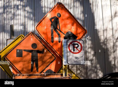 Orange Construction Road Signs And No Parking Sign Stock Photo Alamy