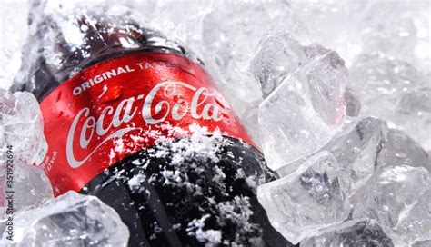 Bottle Of Coca Cola In Crushed Ice Stock Photo Adobe Stock