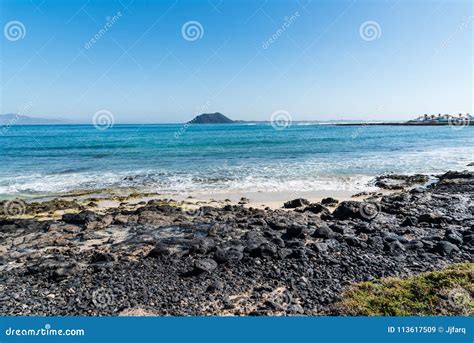 Beach of Corralejo Bay stock image. Image of lava, tourism - 113617509