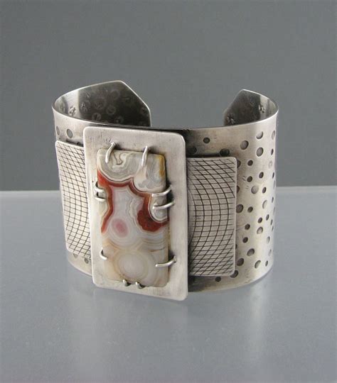 Layers of sheet metal. By Connie Fox. | Jewelry art, Metalwork jewelry ...