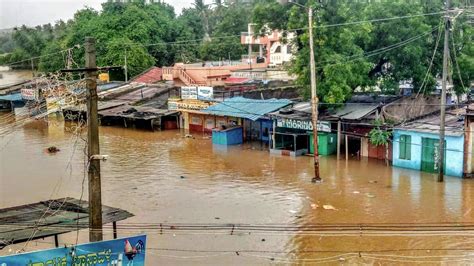 In Pics Floods Wreak Havoc In Maharashtra Karnataka