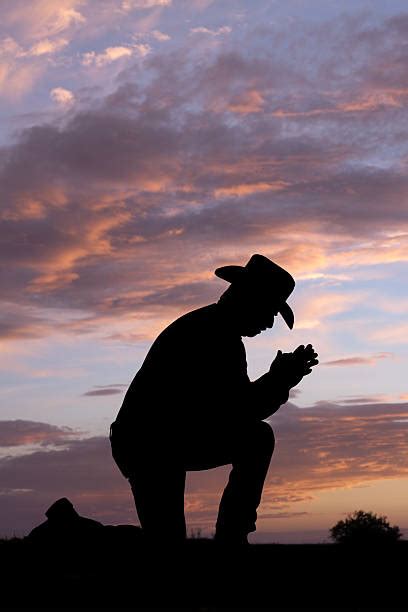 Praying Cowboy Stock Photos, Pictures & Royalty-Free Images - iStock