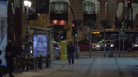 Night view of street and Metropolis Building in Madrid, Spain 28709530 Stock Video at Vecteezy