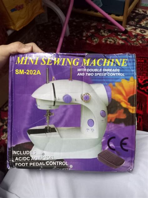 Mini sewing machine SM-202A, Everything Else, Others on Carousell