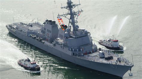 US Navy destroyer 'shoots down drone launched from Yemen' after reports of attack on commercial ...