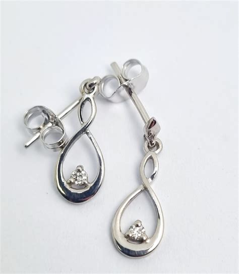 White Gold Drop Earrings Rocks And Diamonds Taupo