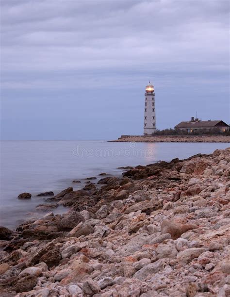 Lighthouse At Rocky Shore Stock Photo Image Of Shore 16746728