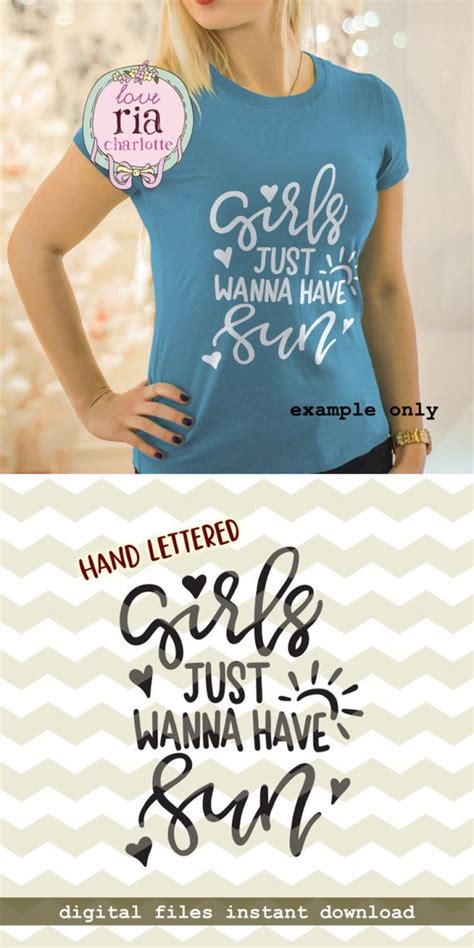 A Woman Wearing A Blue Shirt With The Words Girls Just Have Sun Written