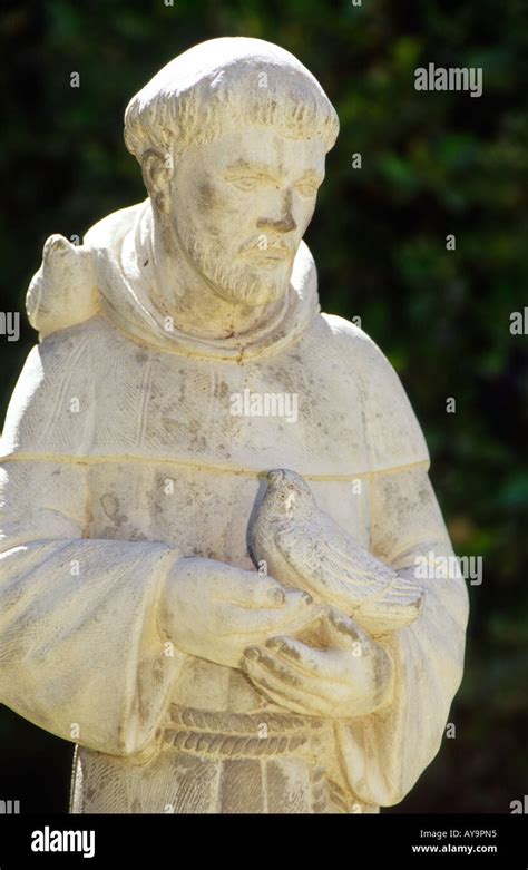 A Stone Sculpture Of Saint Francis Of Assisi At Saint Francis De Paula Mission In Tularosa New