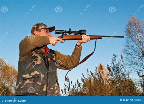 Hunter Aiming Gun Stock Photography CartoonDealer 2157902