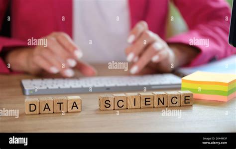 Hands Typing On Keyboard And Data Science Text On Cubes Stock Photo Alamy