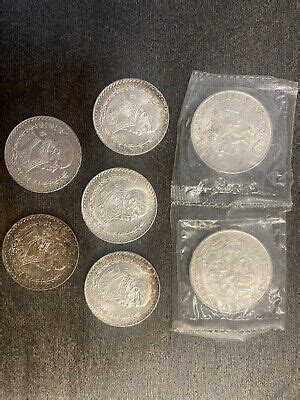 Mexico Olympics Silver Coins In Original Plastic And Un Peso