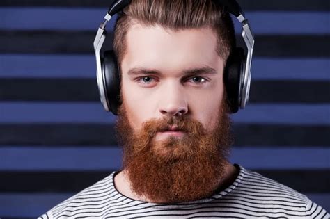 Bearded Man In Headphones Stock Photo Gstockstudio 57221331