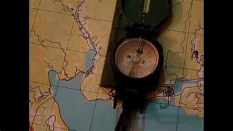 How To Orient A Map Using A Compass Youtube