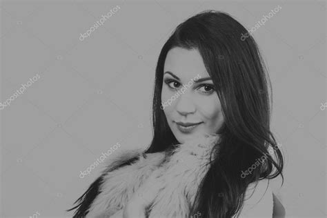 Sexy Brunette On A White Background Professional Makeup Photo For Fashion Magazines Posters