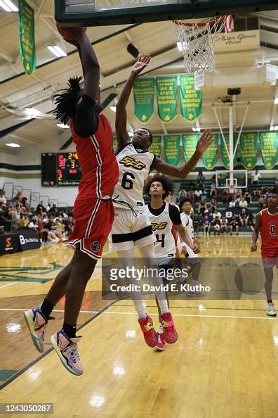 Akron Strive for Greatness Bryce Maximus James in action, defends vs ...