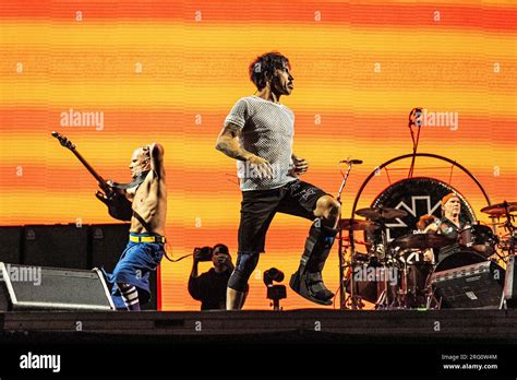 Flea From Left Anthony Kiedis And Chad Smith Of The Red Hot Chili Peppers Perform On Day Four