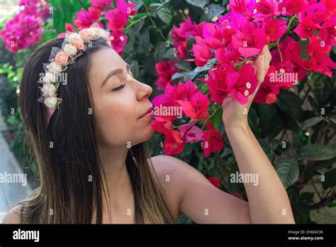 Cute Brunette Teenager Girl With Flowered Tiara Or Hairband On Garden Hippie Costume Concept