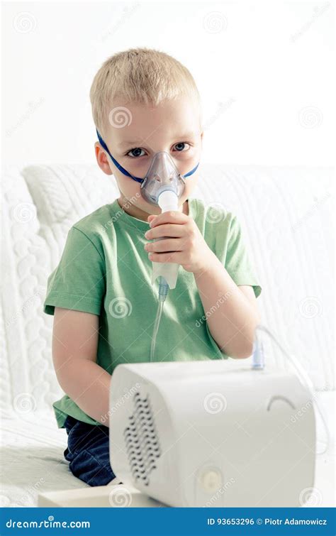 Boy Making Inhalation With Nebulizer At Home Stock Photo Image Of