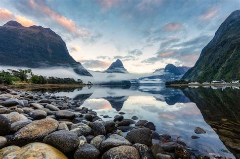 Premium Photo Milford Sound With Mitre Peak And Foggy On The Lake At