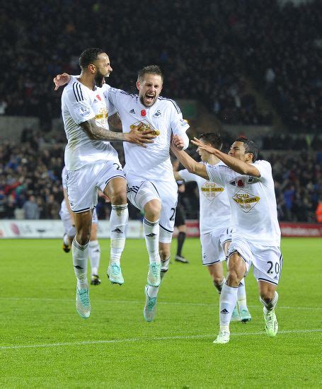 Swansea Citys Gylfi Sigurdsson Celebrates His Editorial Stock Photo