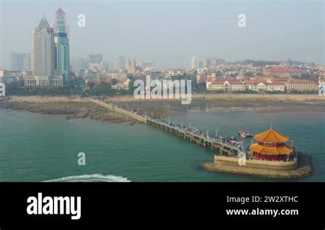 Sunny Day Qingdao City Famous Downtown Olympic Bay Lighthouse Aerial