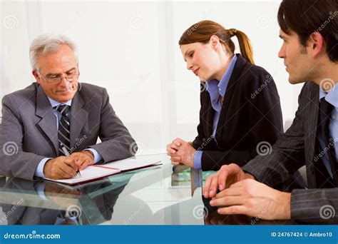 Two Men And One Woman During A Job Interview Stock Images - Image: 24767424