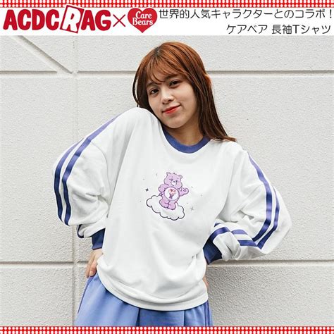 Acdc Rag エーシーディーシーラグ ケアベア ロンt パープル Tシャツ 長袖 原宿 原宿系 ファッション ケアベア コラボ デコラ