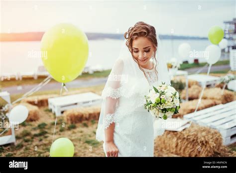 Beautiful Brunette Bride In A White Dress At Wedding Stock Photo Alamy