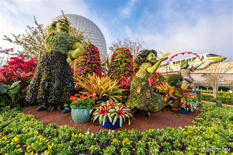 encanto inspired main entrance topiary display