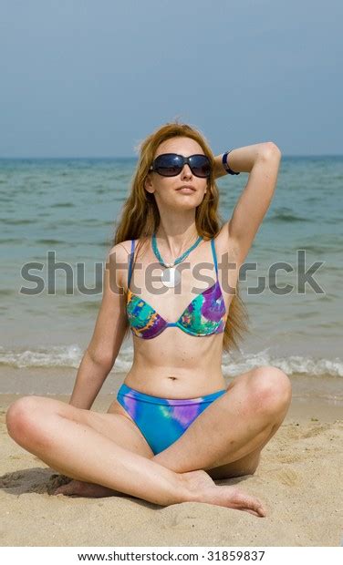 Woman Sits Bikini By Sea Has Stock Photo Edit Now 31859837