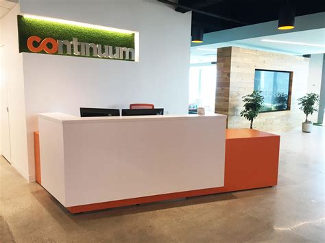 Custom Colors On This Reception Desk Matches The Companys Style And