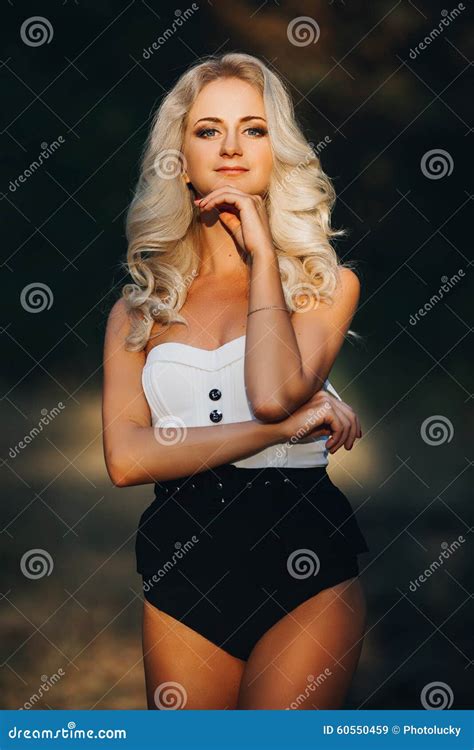 Portrait Of A Beautiful Slim Blonde In Black And Stock Image Image Of Beauty Beach