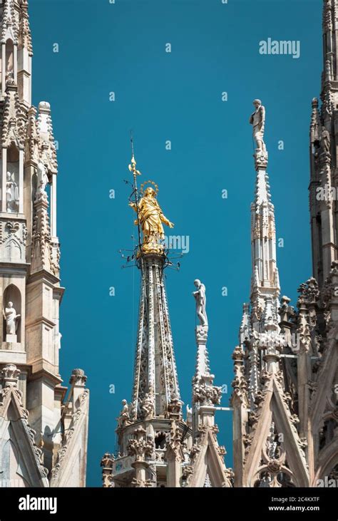 Golden Madonna On Top Of Milan Cathedral Hi Res Stock Photography And