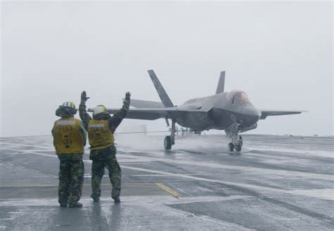 Video F 35c Joint Strike Fighter Makes Rainy Day Landing On Carrier Uss Dwight D Eisenhower