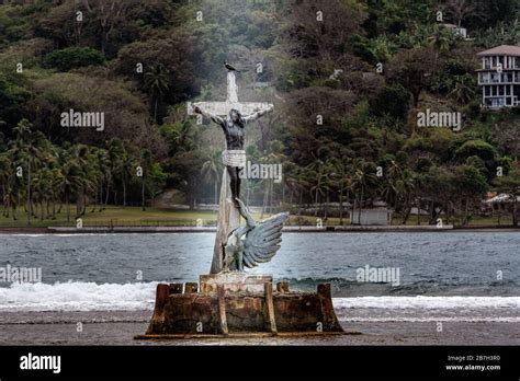 The statue of The Black Christ rises from the surf off the shore of Big ...