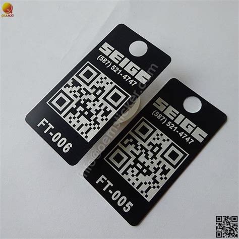 Laser Engraved Serial Numbers And Qr Barcodes On Black Anodized